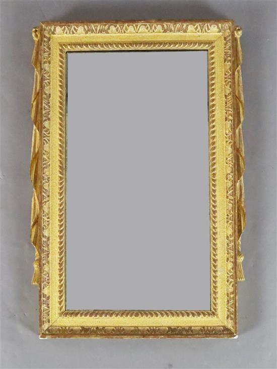 An early 18th century giltwood wall mirror, W.1ft 4in. H.1ft 11in.